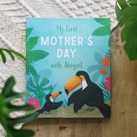 Book cover with two toucans and the title "My First Mother's Day with Abigail." surrounded by monstera leaves.