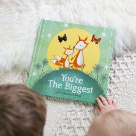 You're The Biggest sibling book in baby cradle.