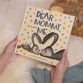 Dear Mommy Love From me gift book for mommy being held. Front cover features baby and adult bunny. Their ears are together in the shape of a heart.